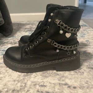 Combat boots with chains